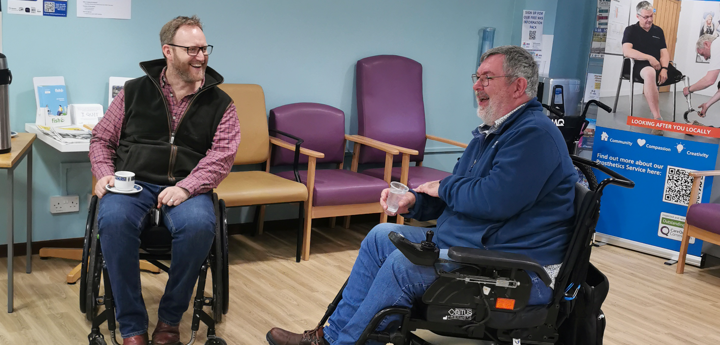 2 Men In Wheelchairs Laughing