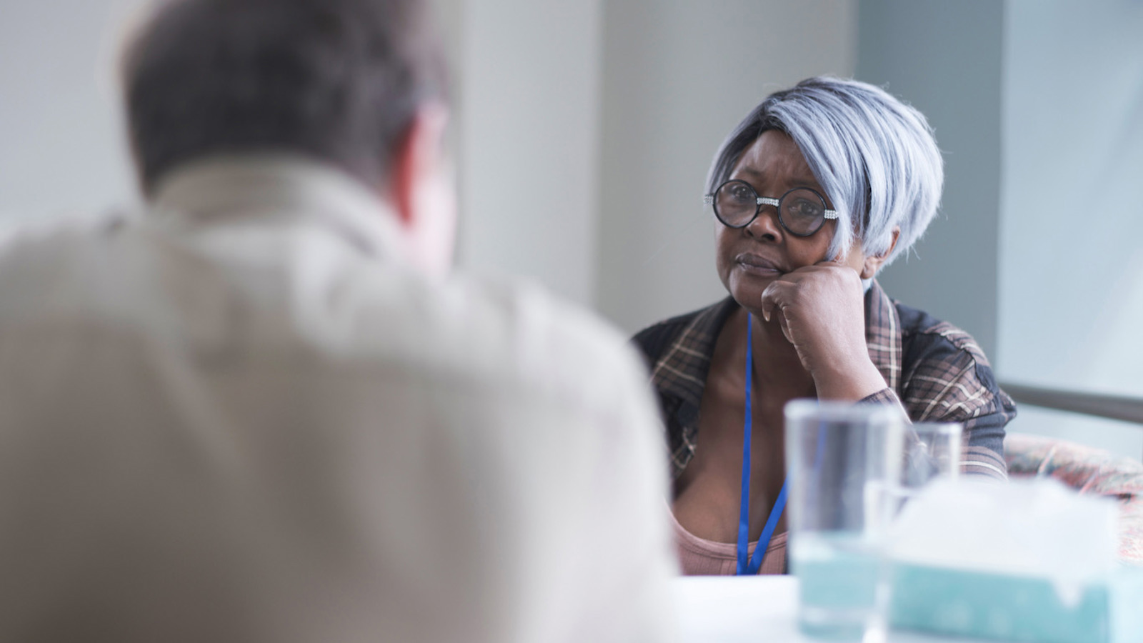 Nhs Worker Talking To Adult Man (1)