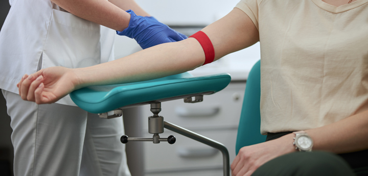 Nurse Taking Blood From Patient