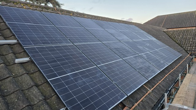 A shot of a set of newly installed solar panels on the roof of Dereham hospital building