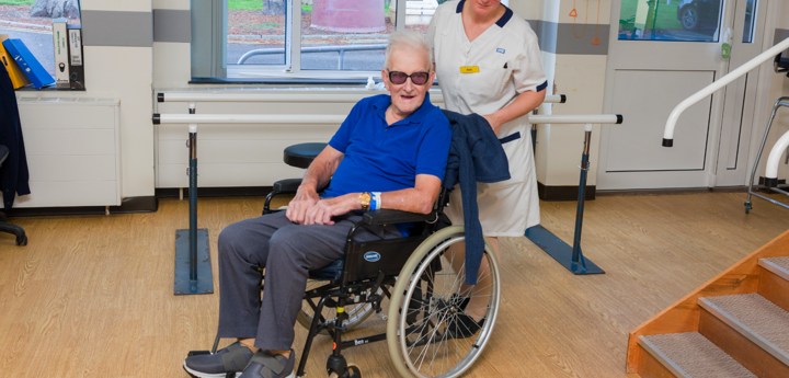 Nurse with a patient in a wheelchair